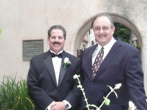 Groom Jeffrey Camp (left) with their officiant Dave